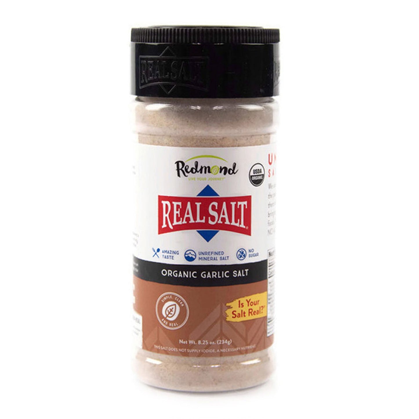 Redmond Real Salt Organic Garlic Salt shaker sits against a white background, showcasing the brand and flavor.